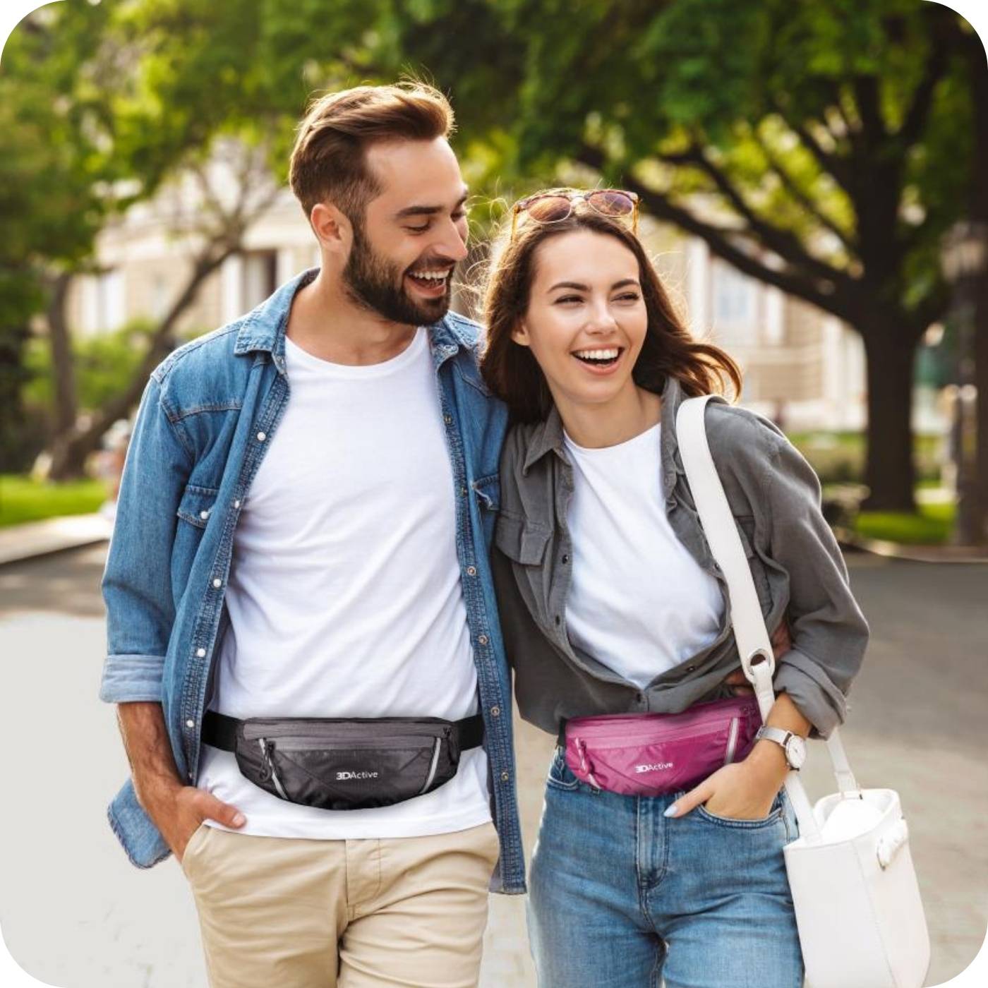 couple walking through the park with their 3dactive running belts around their waists.