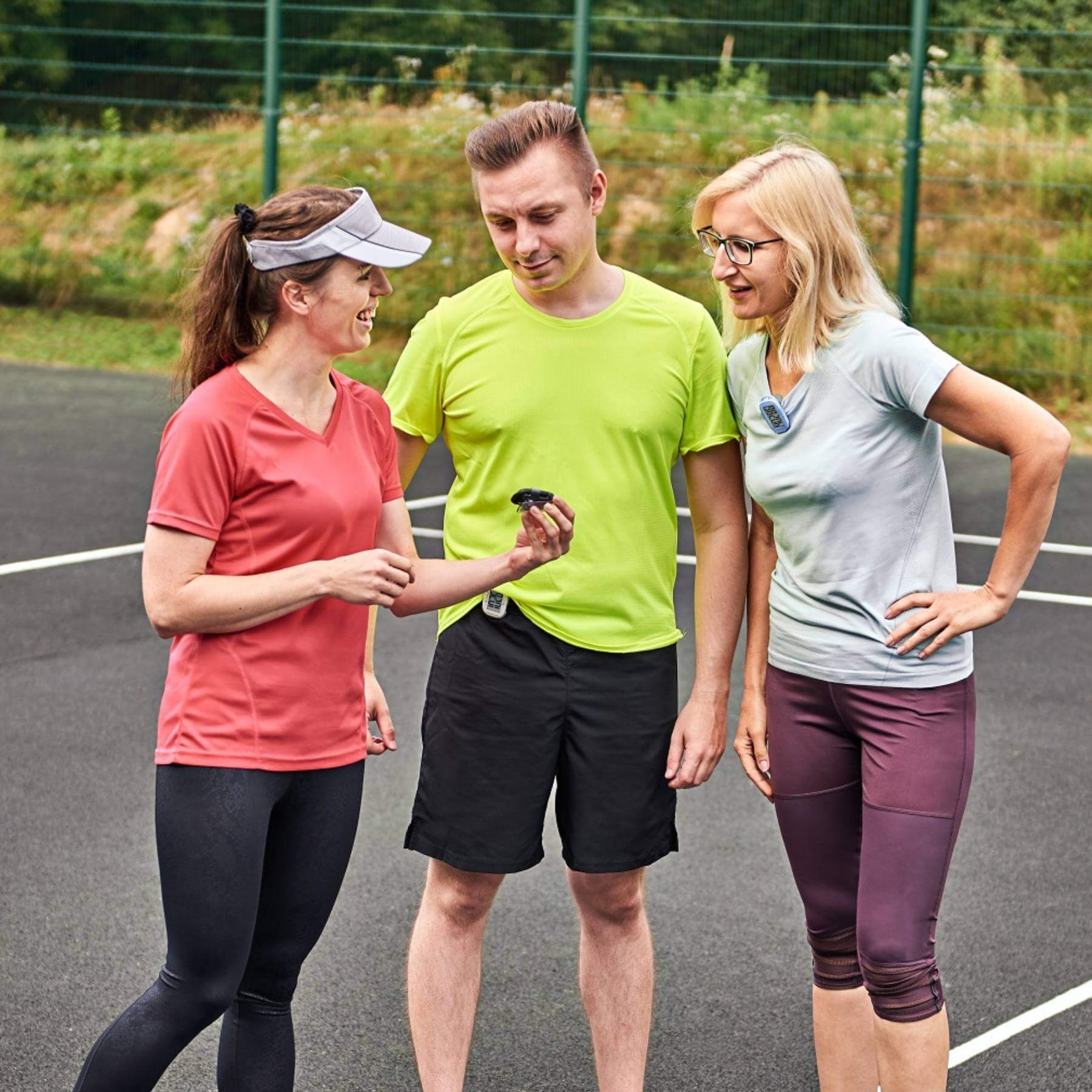 Group of friends sharing the progress of their daily step count on their 3DFitBud Simple Step Counter