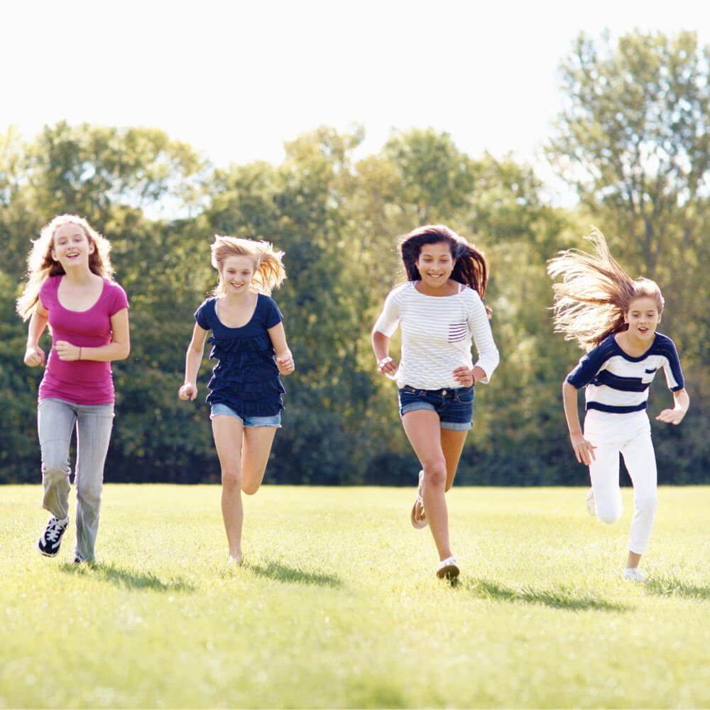 Children running in the field