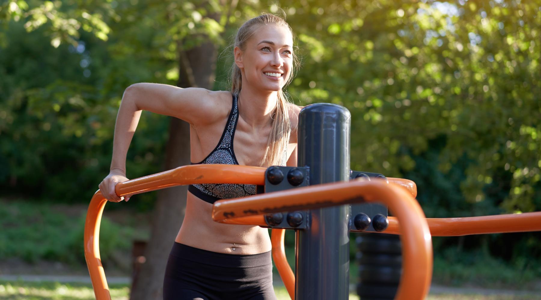 Woman working out in outdoors gym