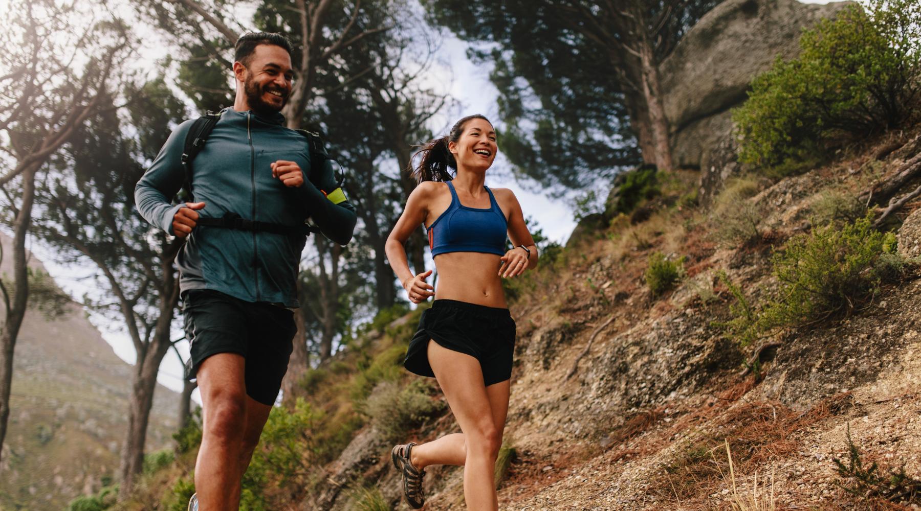 Young fit couple jogging outdoors