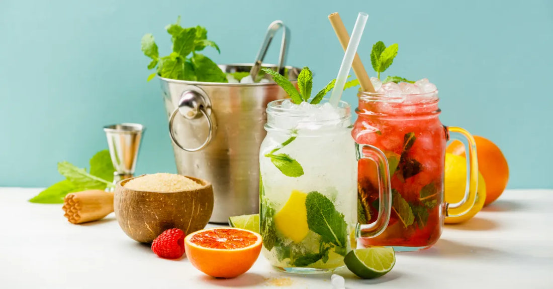 Cold and fruity drinks in mason jars