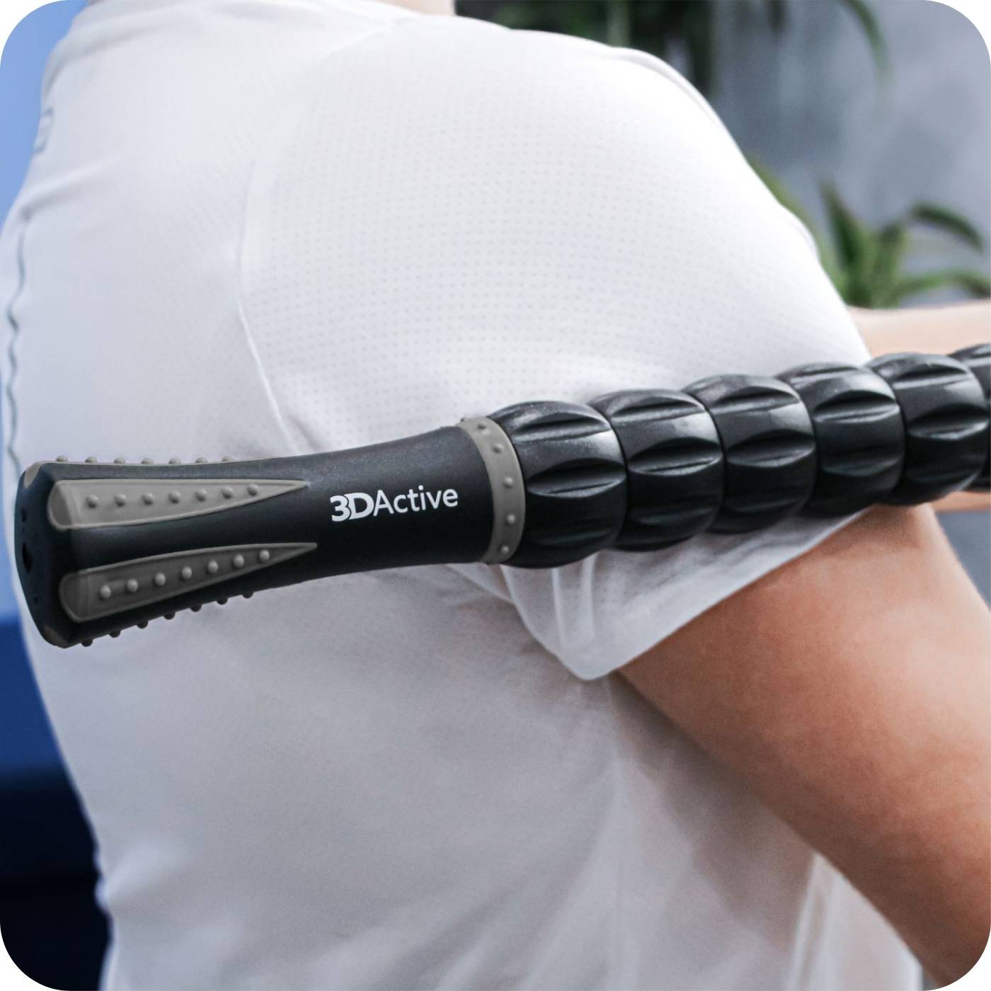 man using his 3dactive muscle roller stick to reduce pain in his arm 