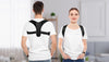 Couple in white t-shirts wearing 3DActive Posture Correctors