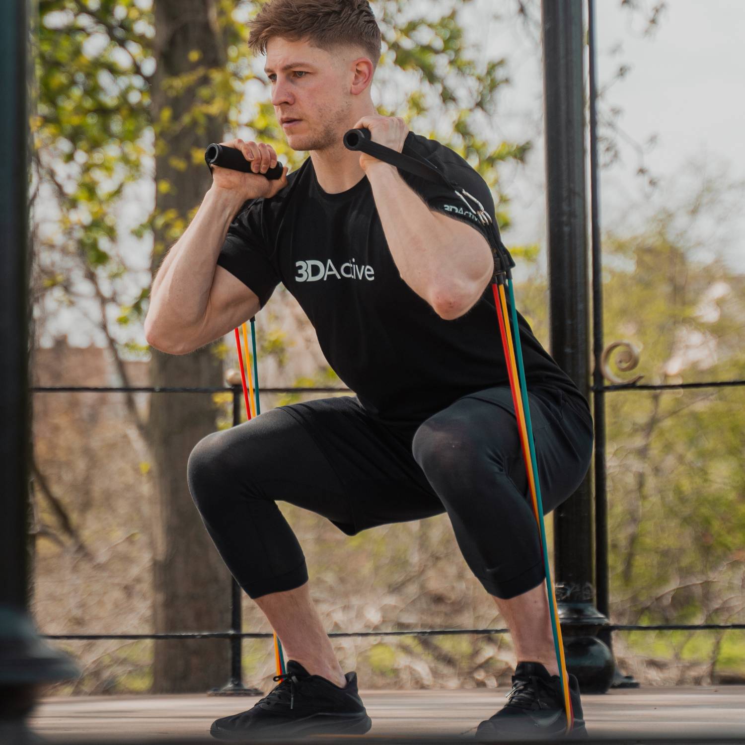 man using 3DActive Resistance Bands in the park